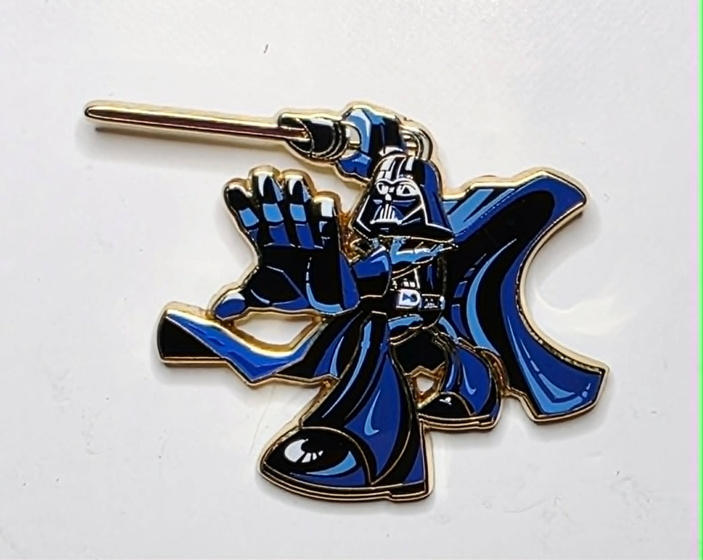 Star Wars - Darth Vader in blue and black holding a lightsaber.