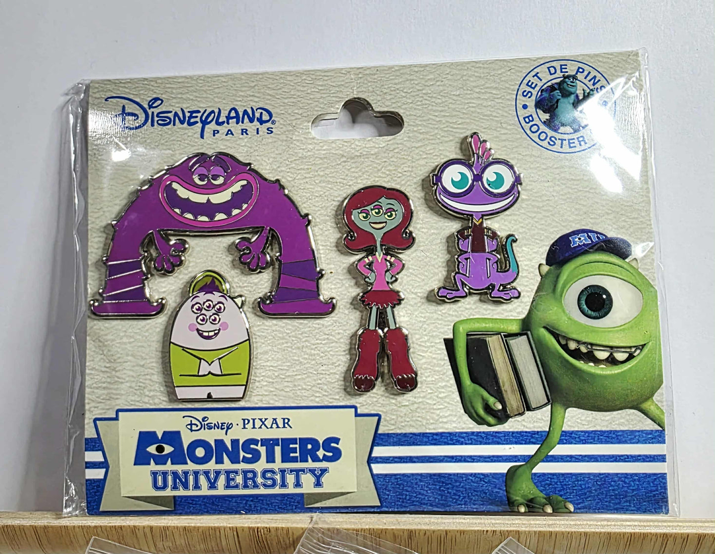 Monsters University pin booster set, celebrating the 10th Anniversary of Monsters University