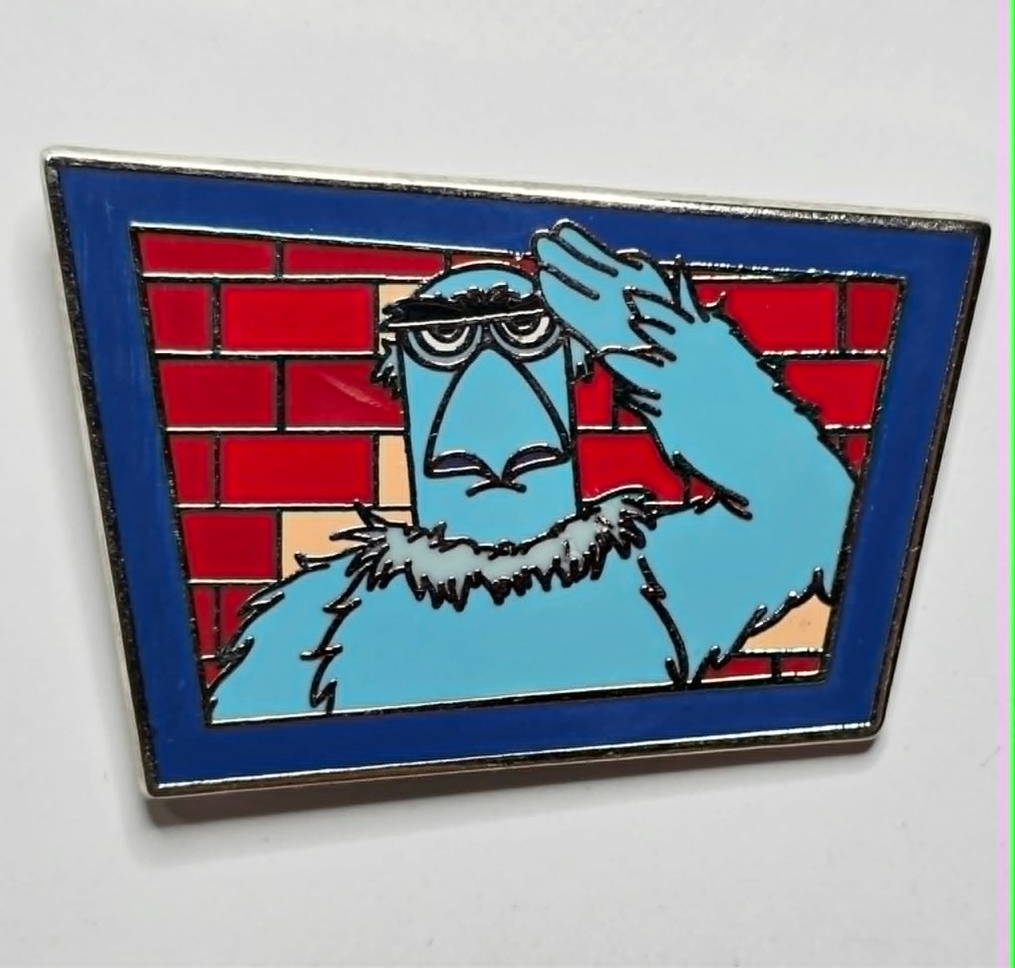 Sam the Eagle pin from The Muppets Brick Wall Mystery Collection.