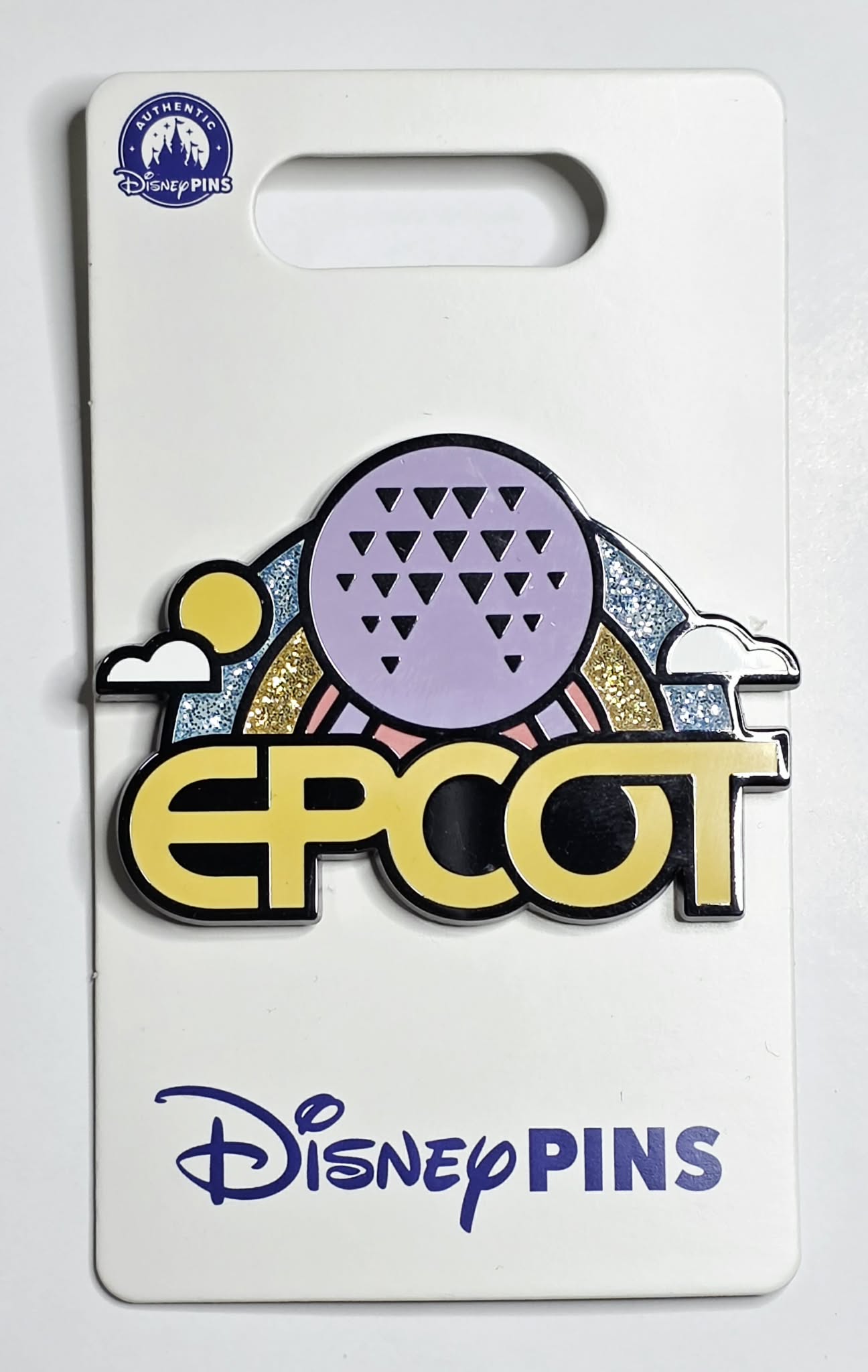 EPCOT Spaceship Earth icon and a rainbow design