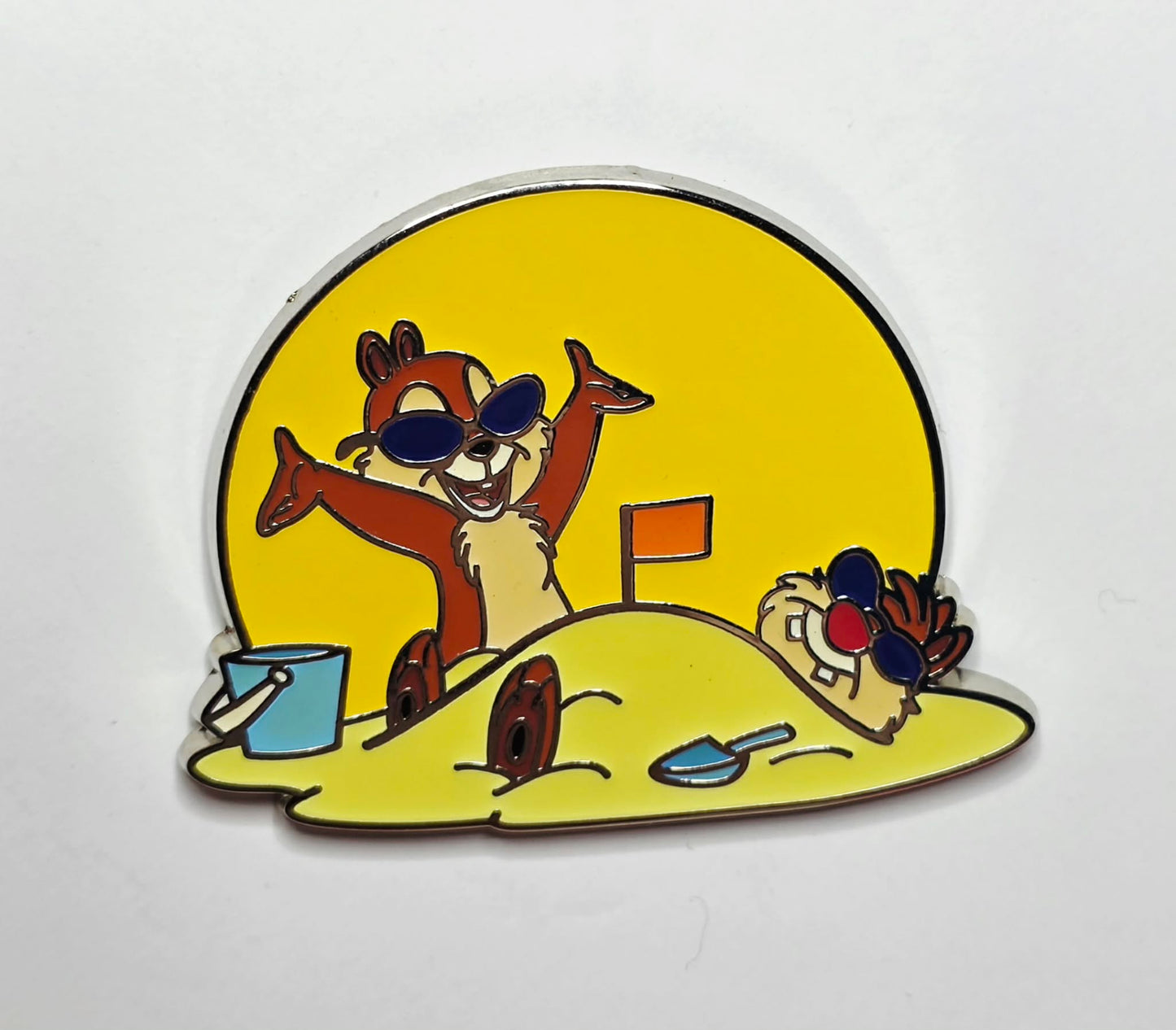 Chip and Dale playing in the sand
