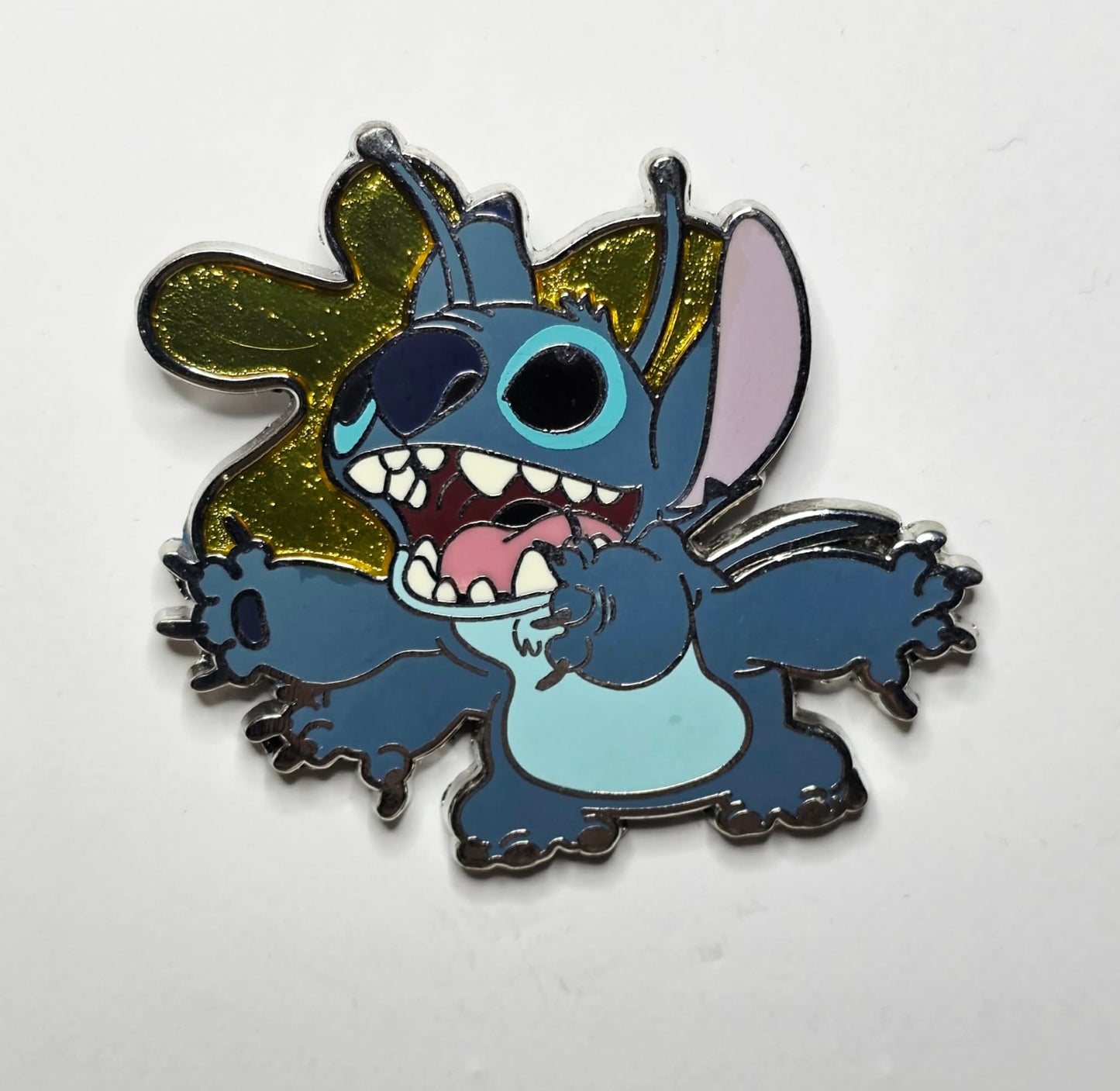 Stitch surrounded by glittery yellow goo