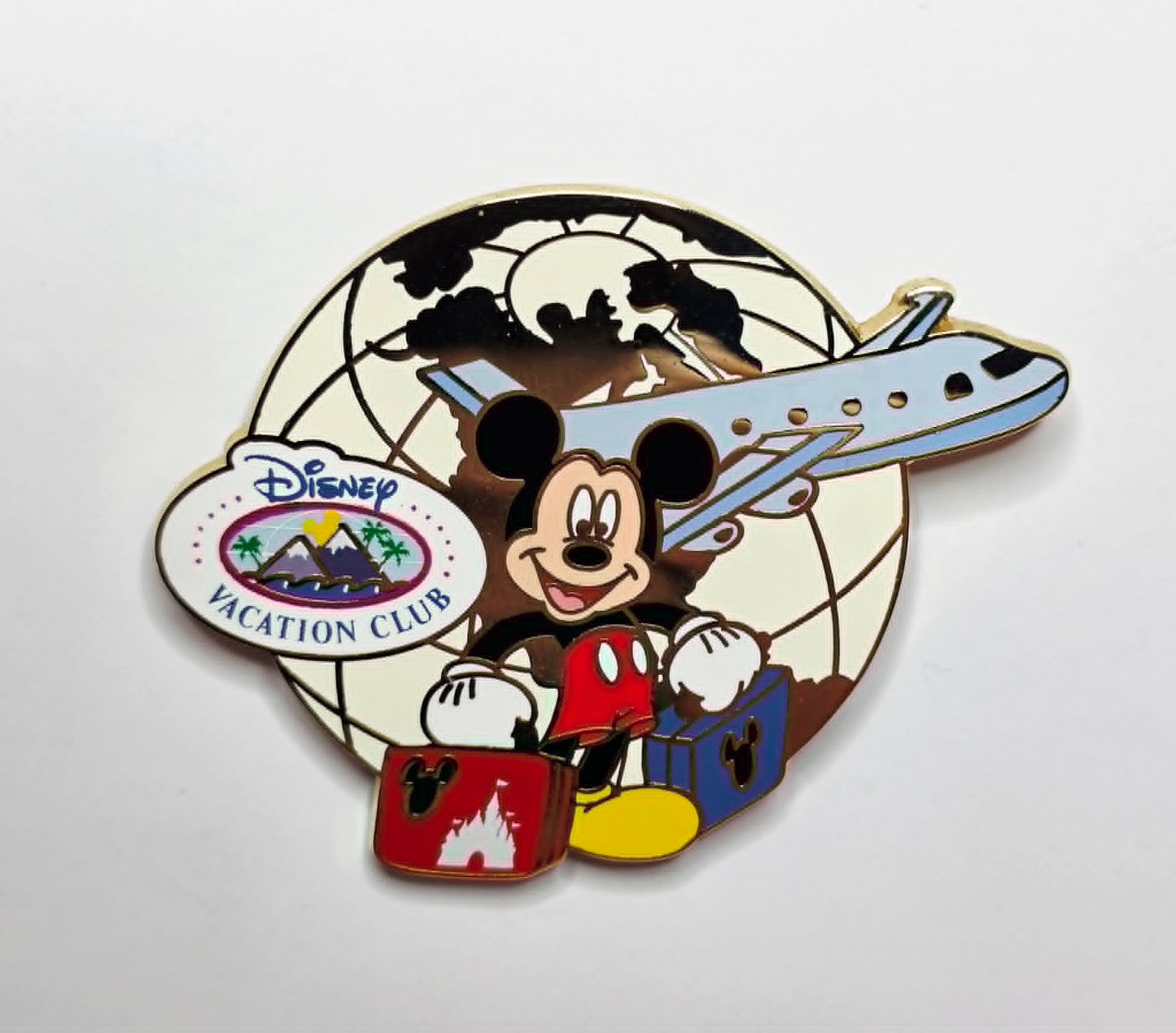 Mickey Mouse - traveling with luggage and a jet airplane.