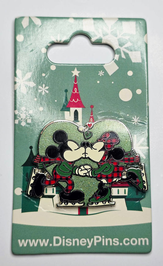 Mickey and Minnie Mouse ice skating and kissing
