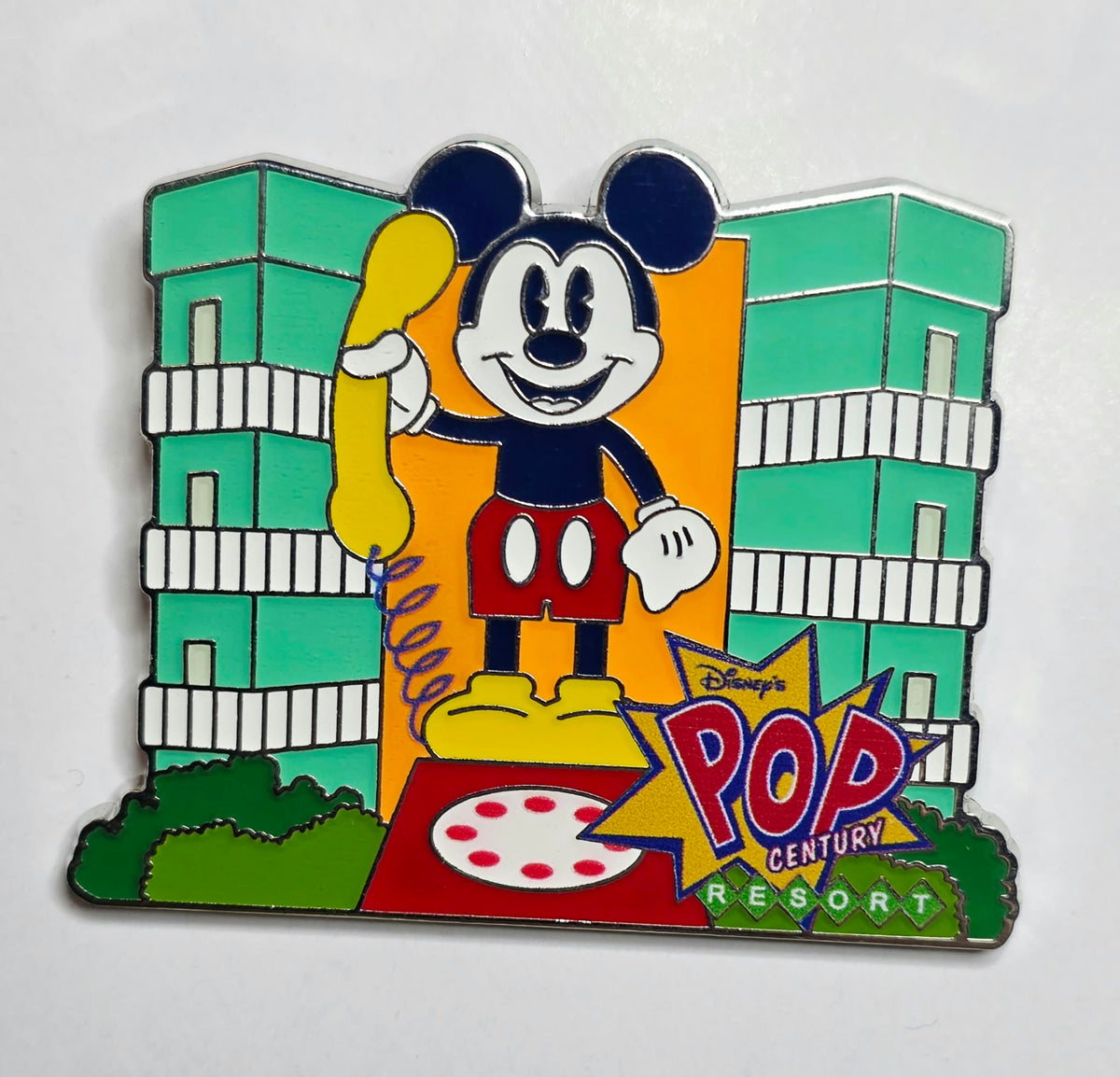 Mickey Mouse holding a giant 1970s rotary telephone at Disney's Pop Century Resort