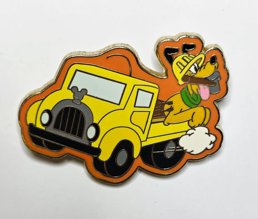 Pluto driving a yellow construction truck