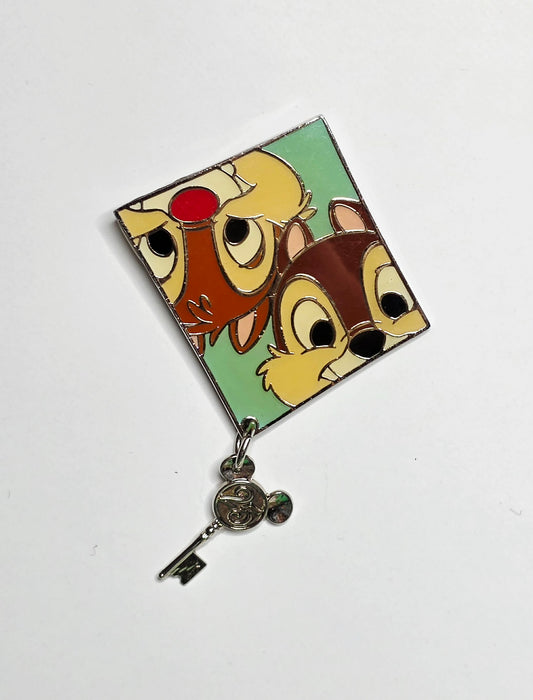 Tokyo Disneyland 25th Anniversary key dangle pin featuring Chip and Dale