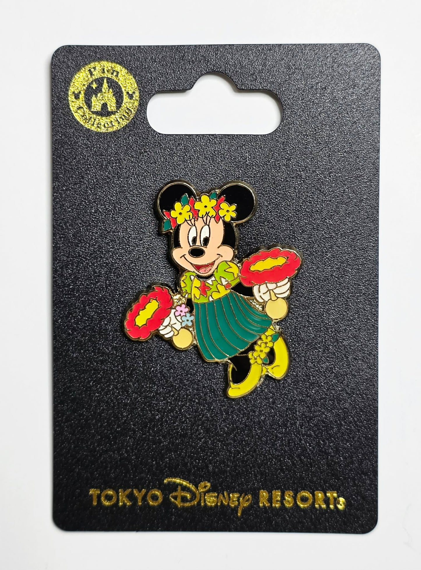 Tokyo Disney Resort and features Minnie in a hula outfit
