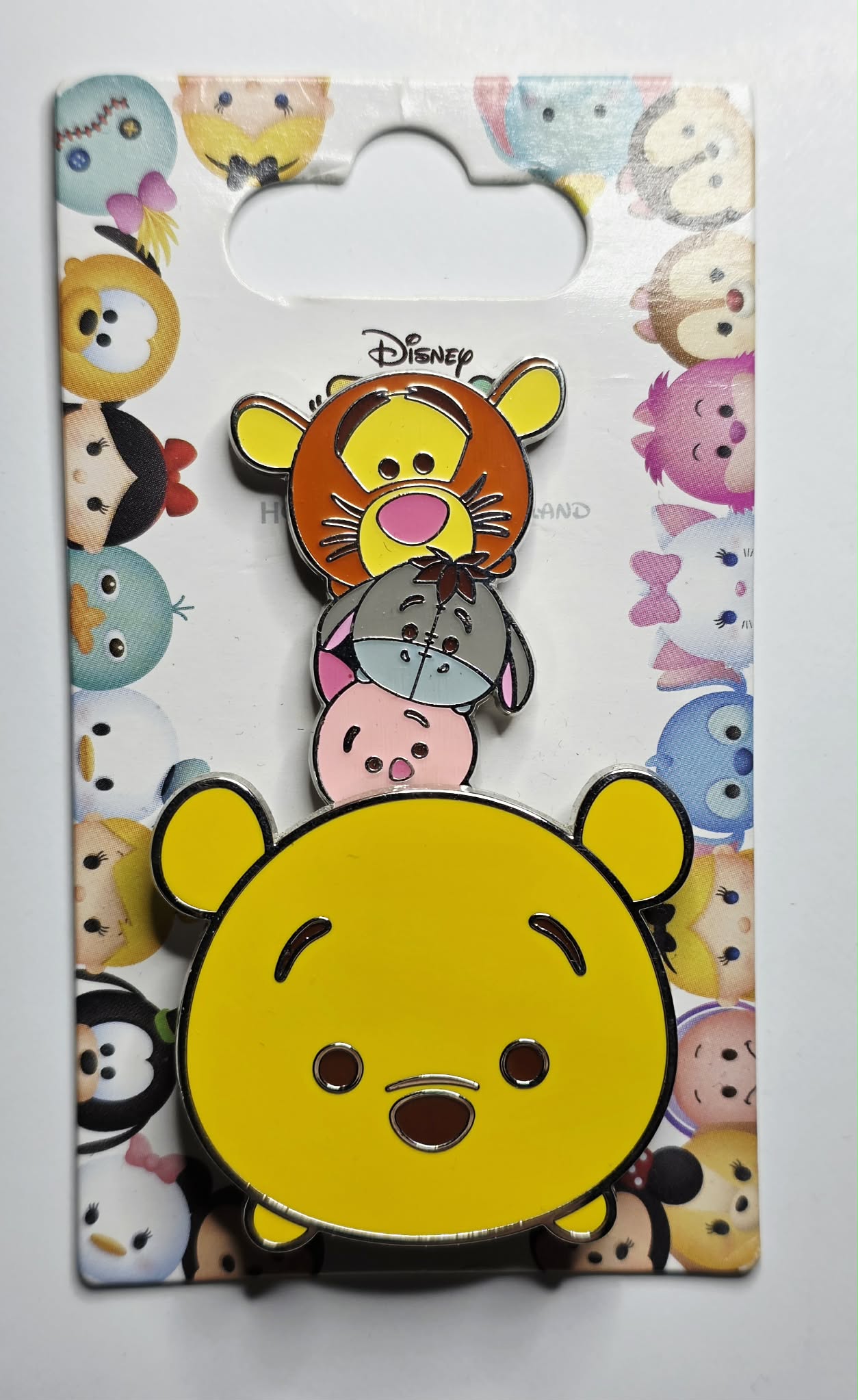Winnie the Pooh, Piglet, Eeyore, and Tigger stacked together in a "Tsum Tsum"