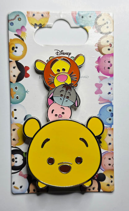 Winnie the Pooh, Piglet, Eeyore, and Tigger stacked together in a "Tsum Tsum"