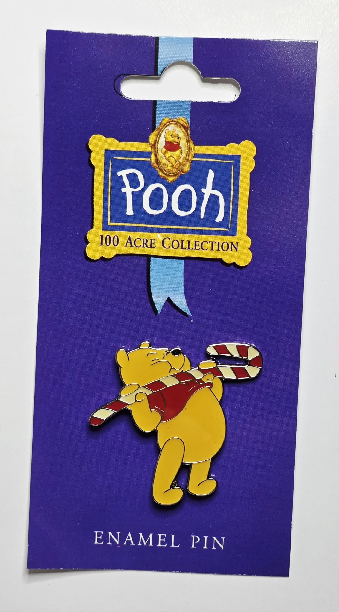 Winnie the Pooh - Pooh lifting a large candy cane