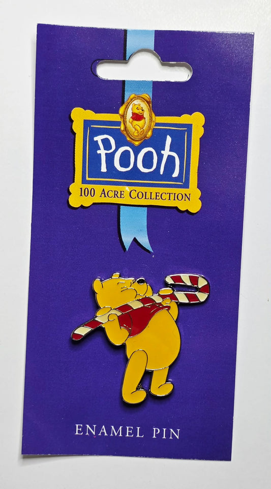 Winnie the Pooh - Pooh lifting a large candy cane