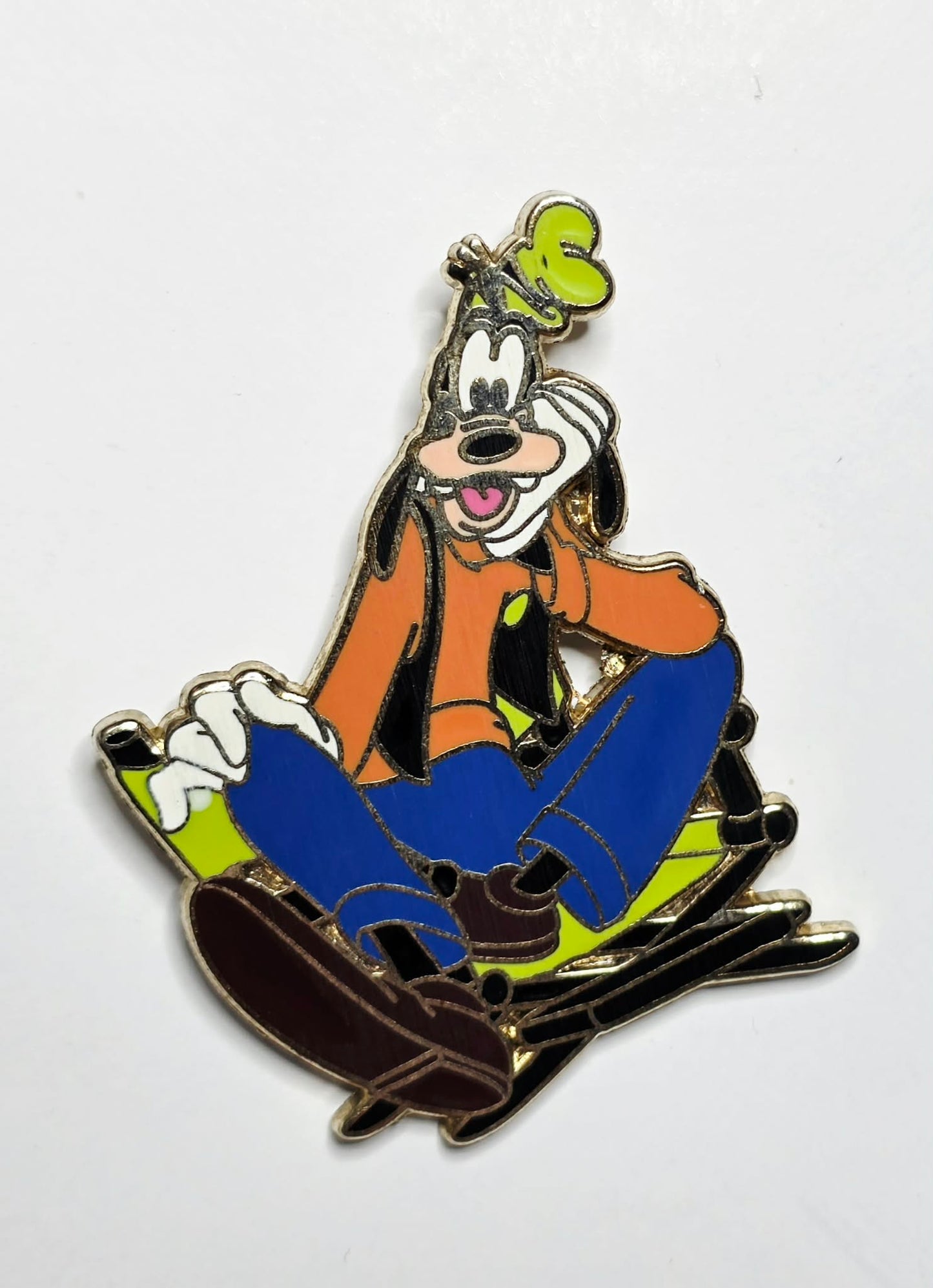 Goofy - sitting in a lime-green-accented director's chair