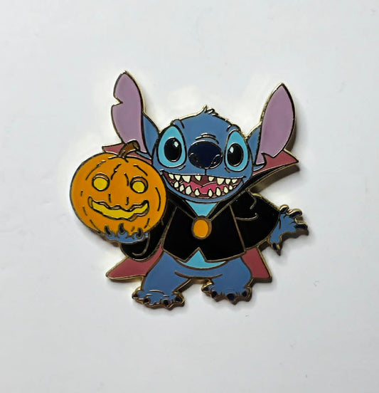Stitch -  Dracula, holding a jack-o'-lantern pumpkin - Halloween in 2003