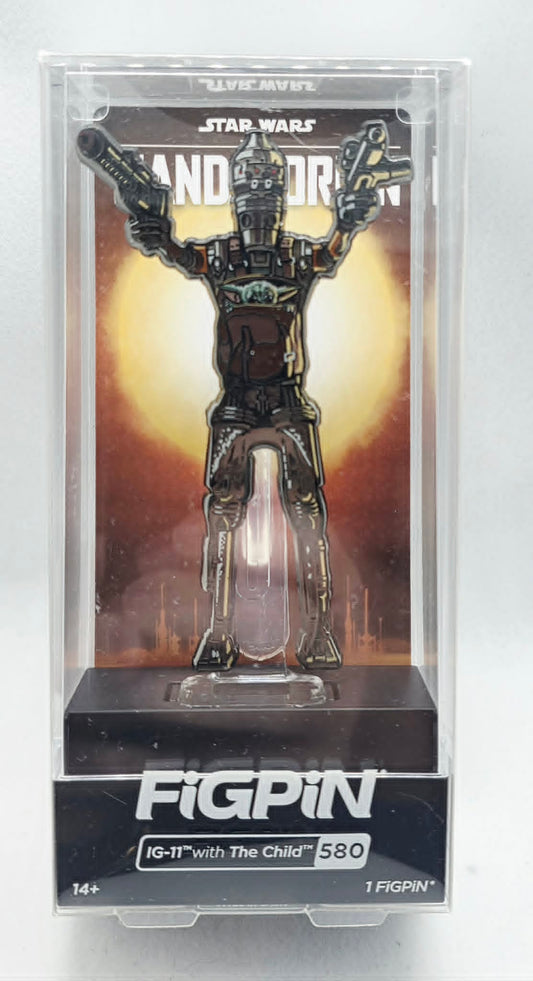 Star Wars The MandalorianIG-11 holding The Child (Grogu)
