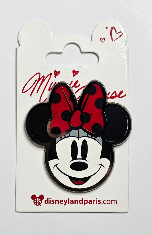 Minnie Mouse face with polka dot bow - Disneyland Paris.