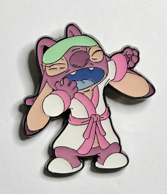 Stitch & Angel Bedtime Blind Box pin of the character Angel in pajamas. (Copy)