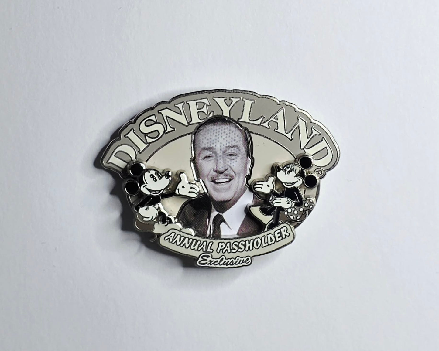 Disneyland Annual Passholder Exclusive pin featuring Walt Disney with Mickey and Minnie Mouse.