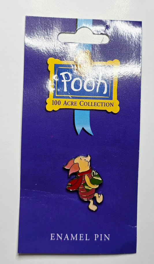 Winnie the Pooh - Piglet carrying a green Christmas gift