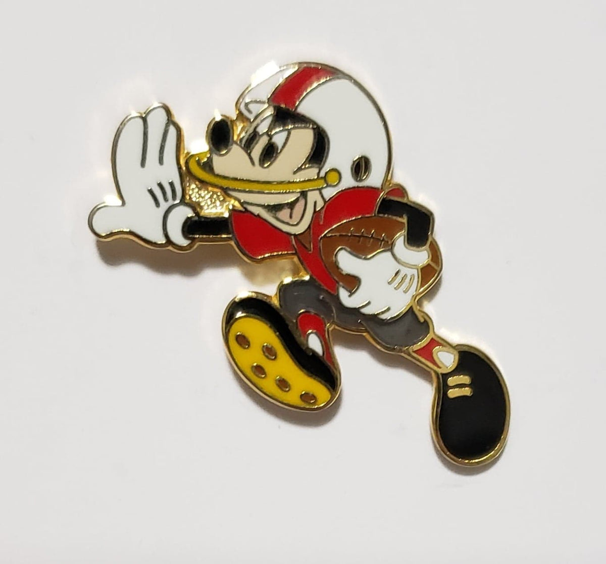 Mickey playing Football